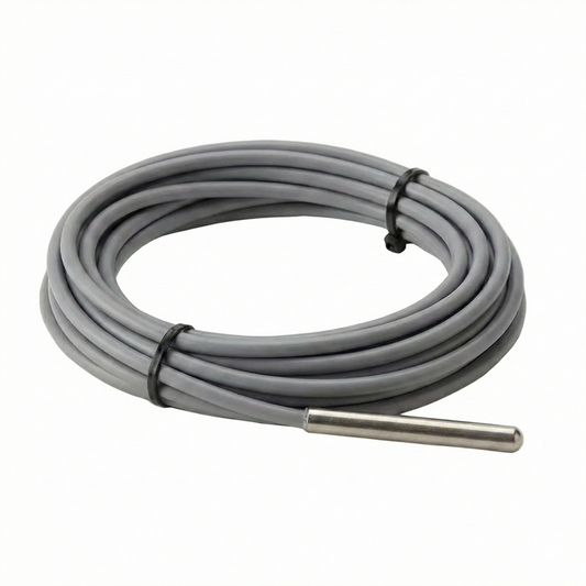 Coiled gray cable with a metal probe on a light beige background