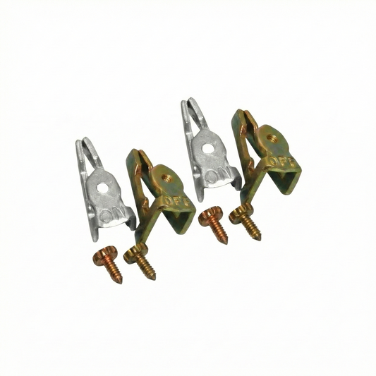 Metal clamps and screws on a white background